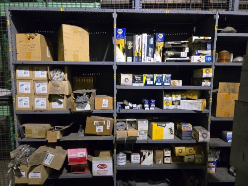 Lot of Miscellaneous Auto Parts with Shelving Units - Image 4